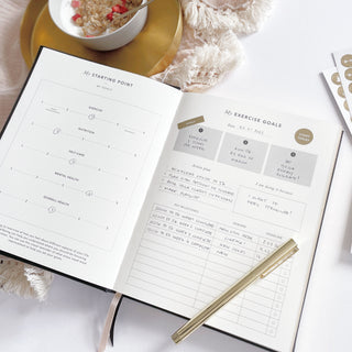 The Daily Fitness Planner covers 365 days of workout and meal planning. The fitness planner has an elegant vegan leather cover with 3 pages of gold stickers. 208 pages of fitness, meal planning, motivation and tracking. Hardback binding with foiled gilt edging to the pages. 165mm (W) x 210mm (H)