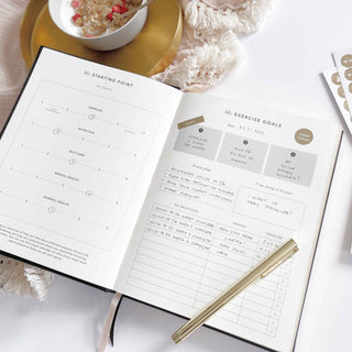 The Daily Fitness Planner covers 365 days of workout and meal planning. The fitness planner has an elegant vegan leather cover with 3 pages of gold stickers. 208 pages of fitness, meal planning, motivation and tracking. Hardback binding with foiled gilt edging to the pages. 165mm (W) x 210mm (H)