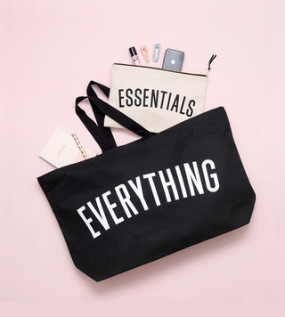 Really big bag with the word EVERYTHING in large white text across the body of the bag. The bag is made from 100% cotton tote and is available in a range of colours.