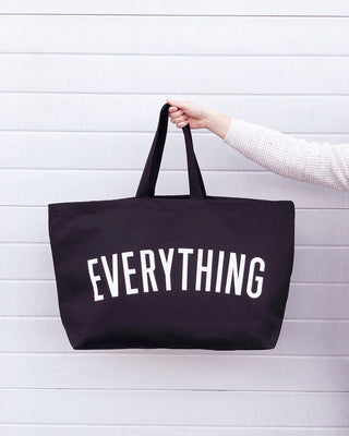 Really big bag with the word EVERYTHING in large white text across the body of the bag. The bag is made from 100% cotton tote and is available in a range of colours.