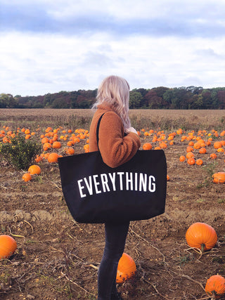 Really big bag with the word EVERYTHING in large white text across the body of the bag. The bag is made from 100% cotton tote and is available in a range of colours.
