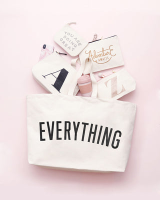 Really big bag with the word EVERYTHING in large black text across the body of the bag. The bag is made from 100% cotton tote and is available in a range of colours.