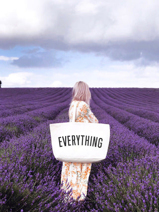 Really big bag with the word EVERYTHING in large black text across the body of the bag. The bag is made from 100% cotton tote and is available in a range of colours.
