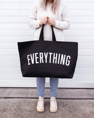 Really big bag with the word EVERYTHING in large white text across the body of the bag. The bag is made from 100% cotton tote and is available in a range of colours.