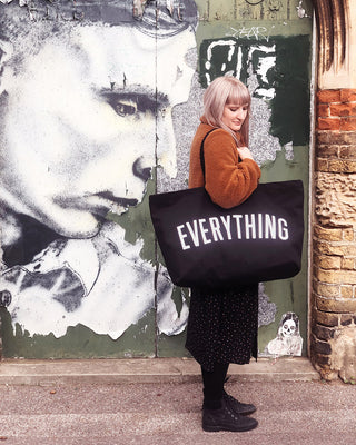 Really big bag with the word EVERYTHING in large white text across the body of the bag. The bag is made from 100% cotton tote and is available in a range of colours.