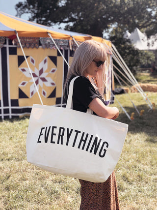 Really big bag with the word EVERYTHING in large black text across the body of the bag. The bag is made from 100% cotton tote and is available in a range of colours.