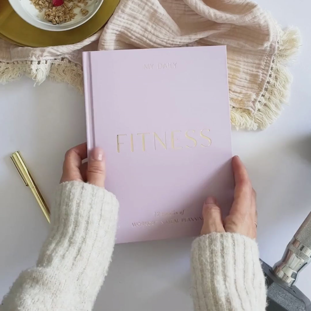 The Daily Fitness Planner covers 365 days of workout and meal planning. The fitness planner has an elegant vegan leather cover with 3 pages of gold stickers. 208 pages of fitness, meal planning, motivation and tracking. Hardback binding with foiled gilt edging to the pages. 165mm (W) x 210mm (H)