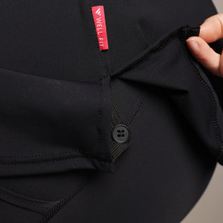 Model demonstrates the 3 button hole elastic strip detailing on the tunic-style Well Fit Connex top that allows the wearer to attach the top to their leggings.